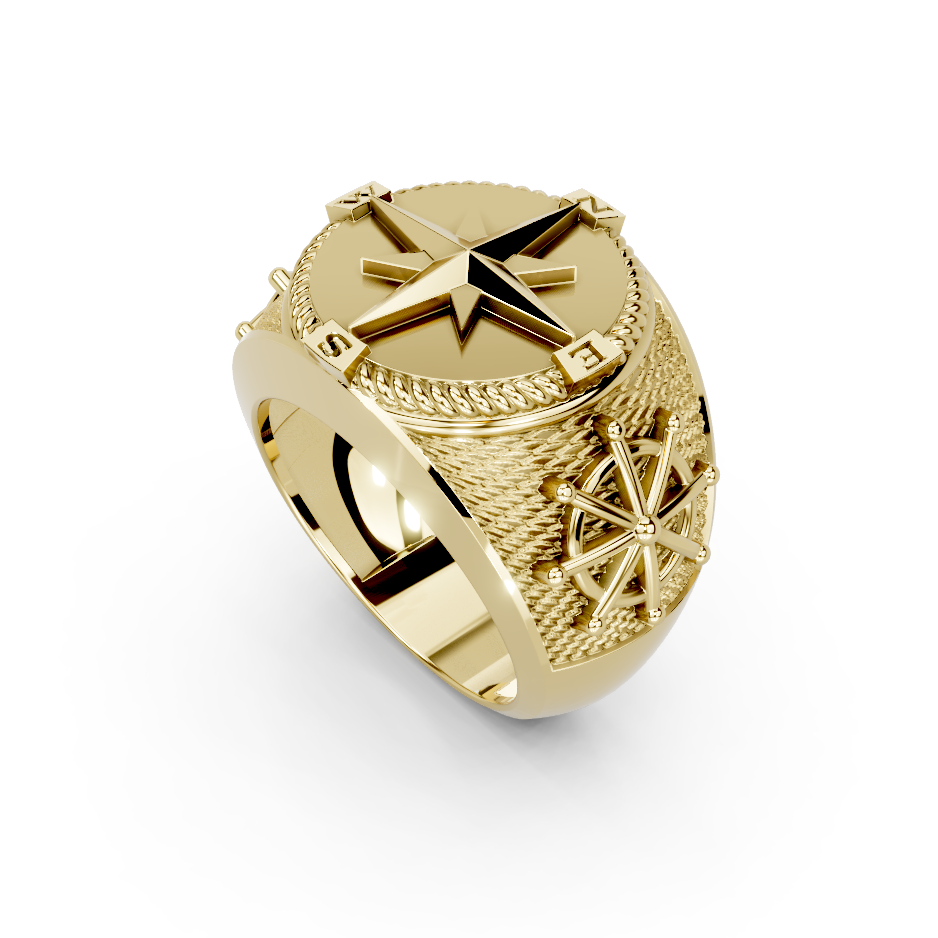 A gold-toned signet ring featuring a highly detailed compass design on the face, including cardinal markers and ornate geometric patterns, shown on a clean white background.